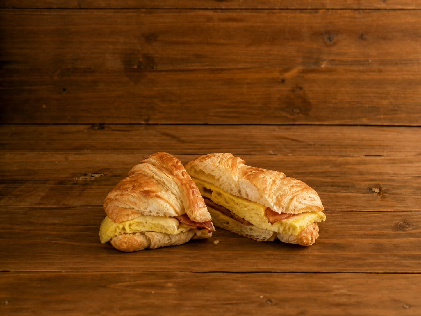 Breakfast sandwich with egg, bacon, and cheese